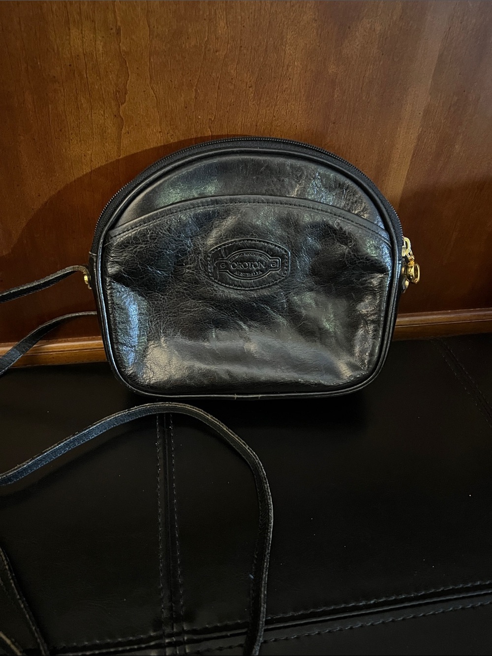 Oroton Black Leather Rounded Crossbody with Gold Hardware